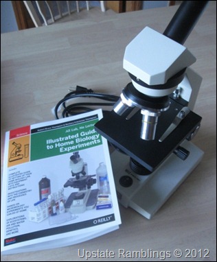 microscope and biology book