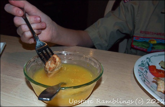 Dipping the Chicken in the Orange Sauce