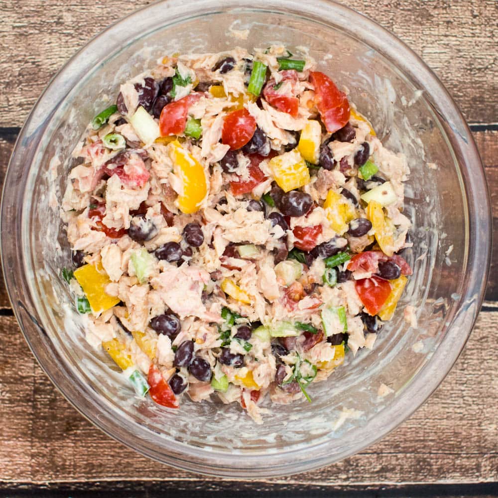Southwestern Tuna Salad - an easy and healthy lunch idea featuring tuna fish with black beans, tomatoes and cilantro, with a Greek yogurt dressing.