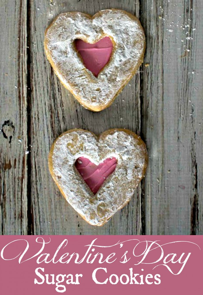Easy Heart Shaped Cookies for Valentine's Day - Heart sandwich cookies with pink frosting and powdered sugar