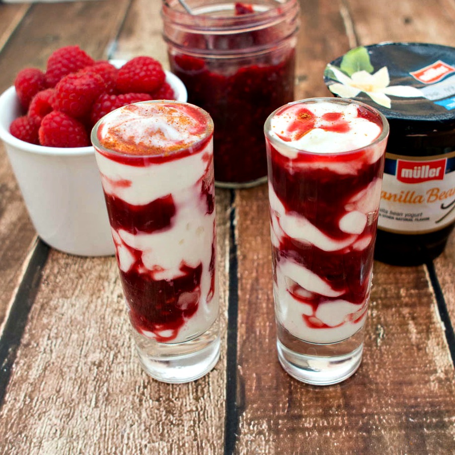 Raspberry Cherry Yogurt Parfait - an easy raspberry and cherry sauce combined with vanilla yogurt for the perfect afternoon snack