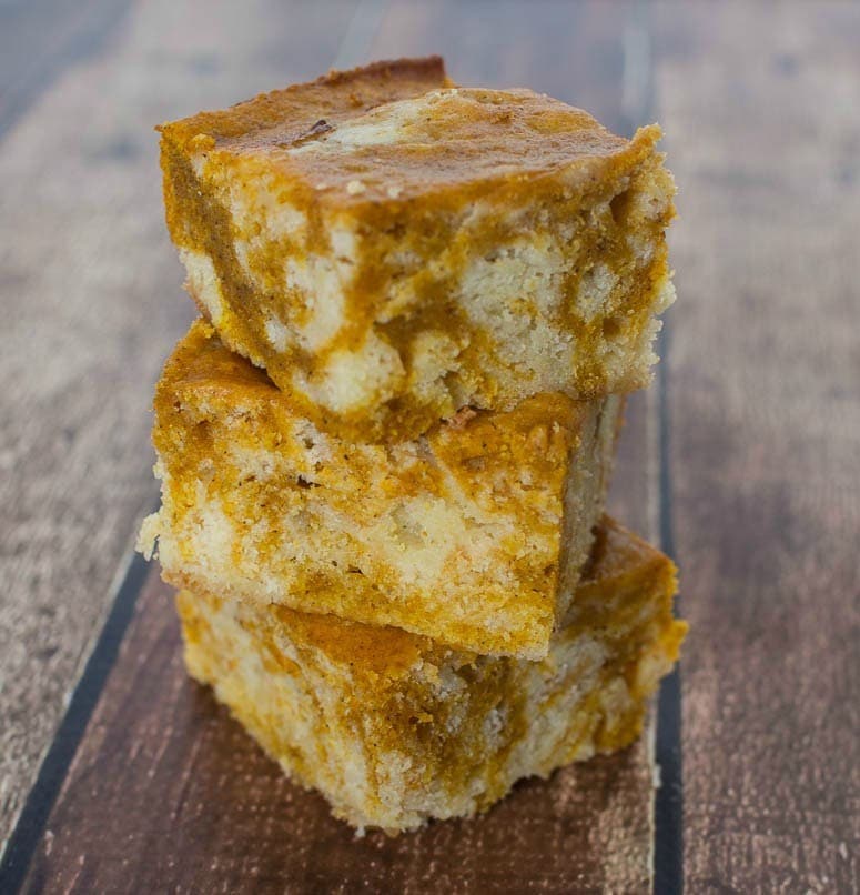 White Chocolate Pumpkin Bars - Layers of white chocolate swirled with pumpkin for a delicious combination of flavors.