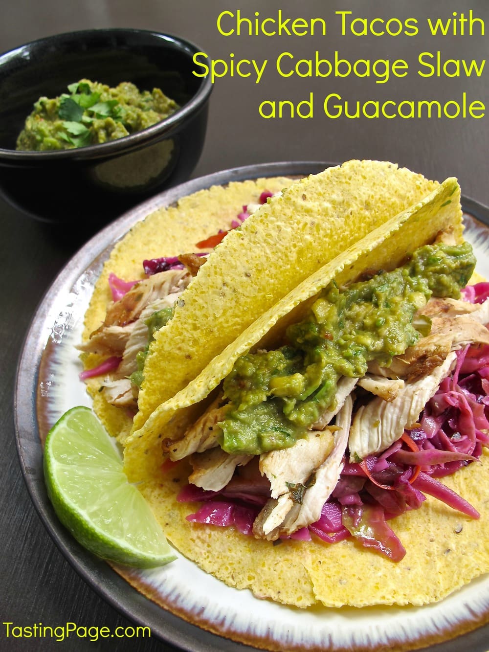 Chicken tacos with spicy cabbage slaw and guacamole