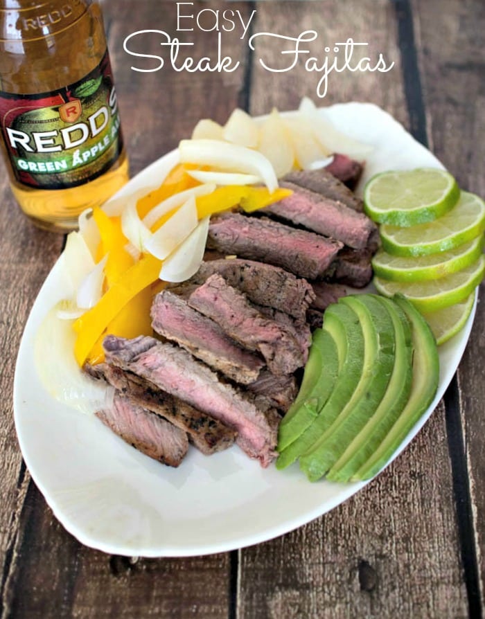 Easy Steak Fajitas - steak marinaded in Redd's Apple Ale, served with onions, peppers, avocado and lime