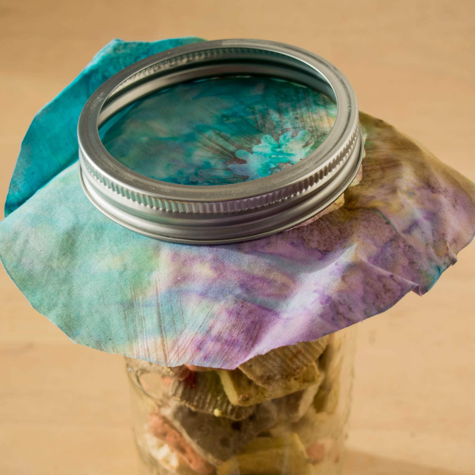 Putting fabric on top of the doggie treat jar