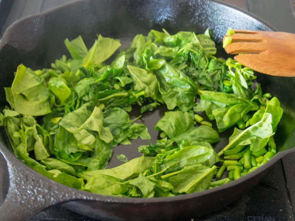 Cooking the spinach for a frittata