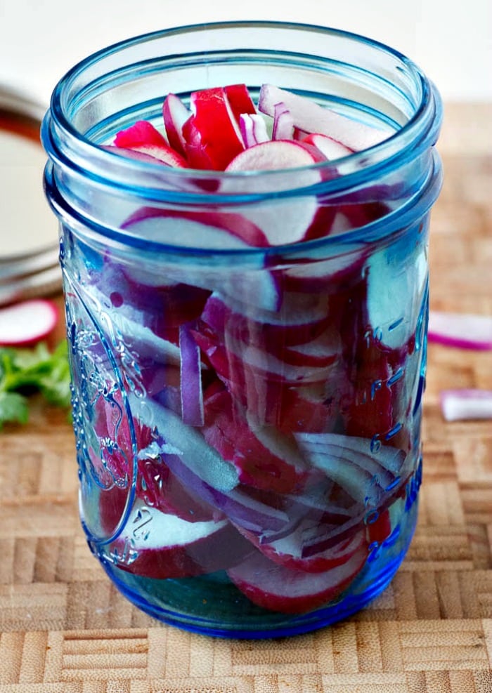 How to Pickle radishes - jar of radishes ready for pickling