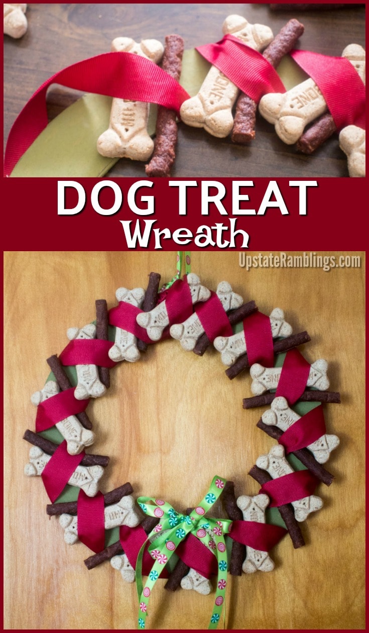 Don't forget your furry friends - celebrate them with a Dog Treat Wreath! This easy to make wreath will have your favorite dog jumping for joy during the holiday season. This makes a perfect holiday decoration - and a great present for your favorite doggie #christmas #dogs #petlover #dogdiy #christmasdecorations