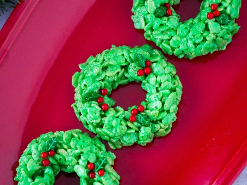Christmas rice krispie treats on a red plate