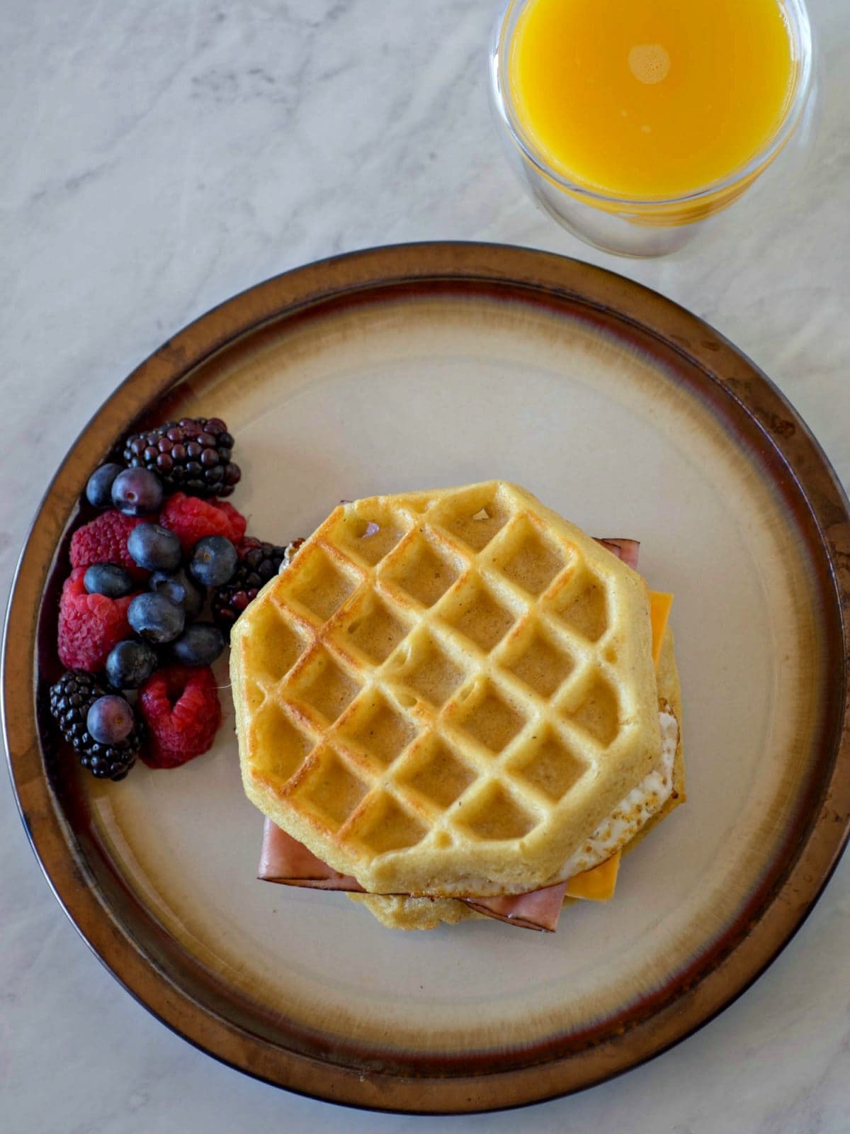 Overhead view of Waffle Breakfast Sandwich with Ham, Egg, Cheese and Eggo Waffles