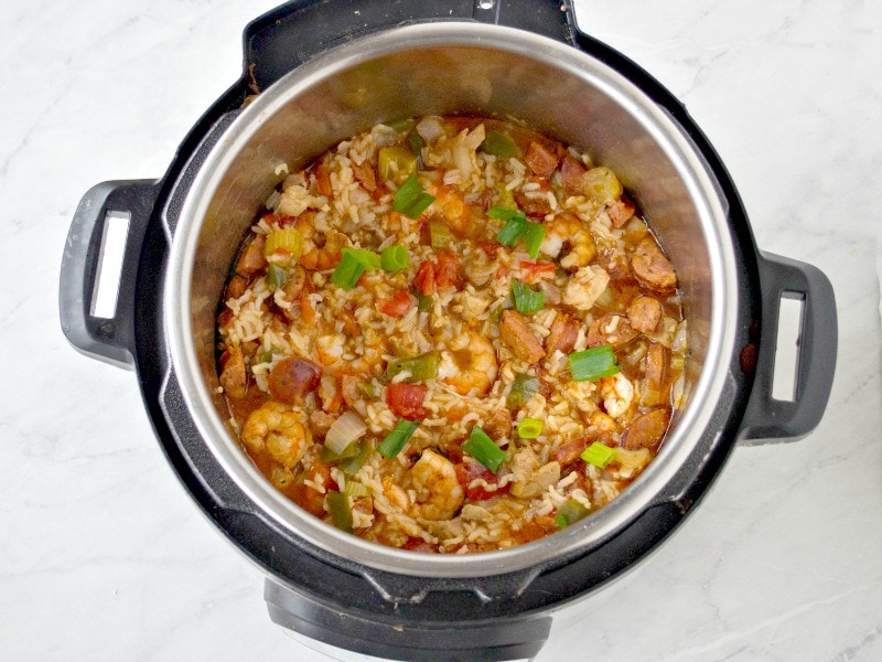 The instant pot jambalaya after pressure is released and the shrimp is added to the dish