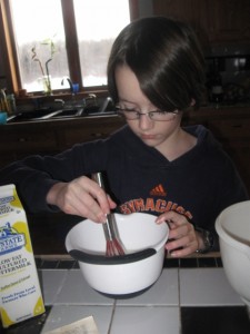 My son making pancakes