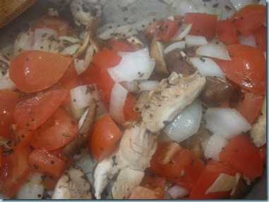 Mixing the tomatoes and mushrooms