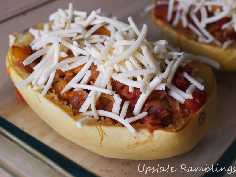 Spicy stuffed acorn squash with meat and cheese.