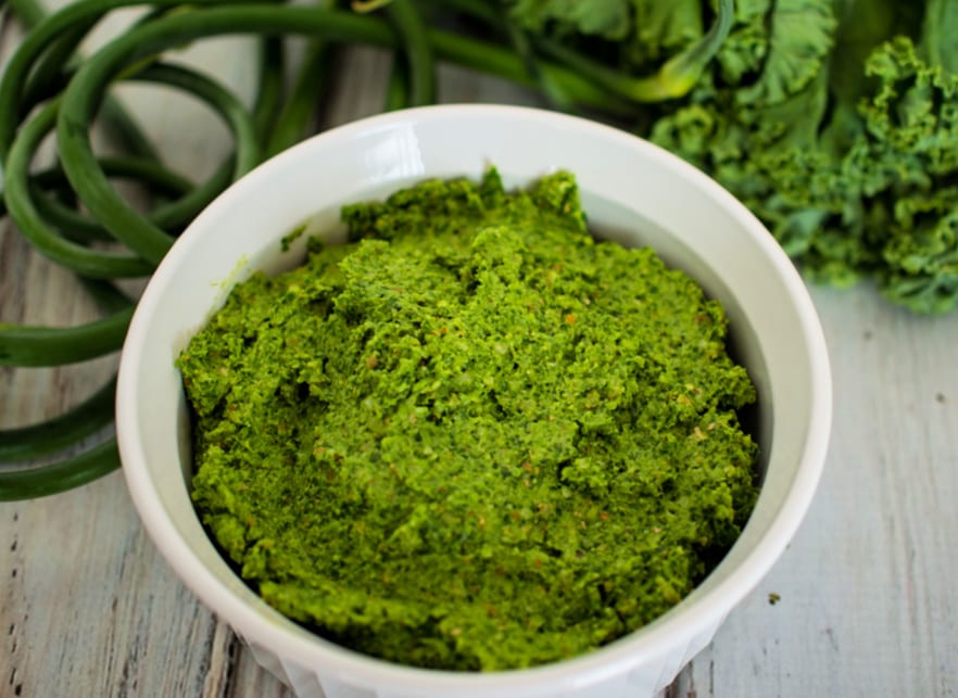 overhead view of kale and garlic scape pesto