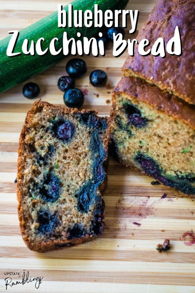 blueberry zucchini bread on a cutting board