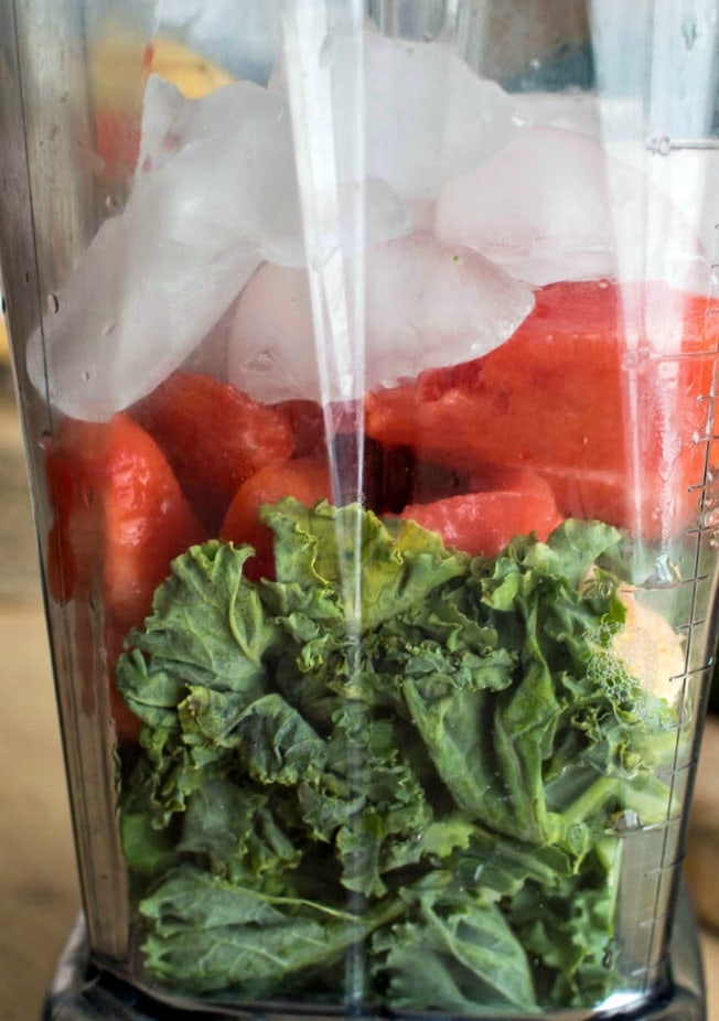 A watermelon smoothie made with kale and watermelon.
