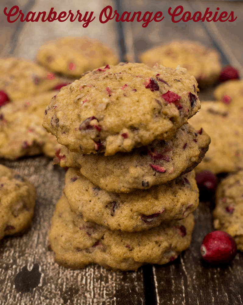 Cranberry orange cookies on a wooden table.