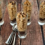 No Bake Peanut Butter Mousse Cups on a Wooden Table.