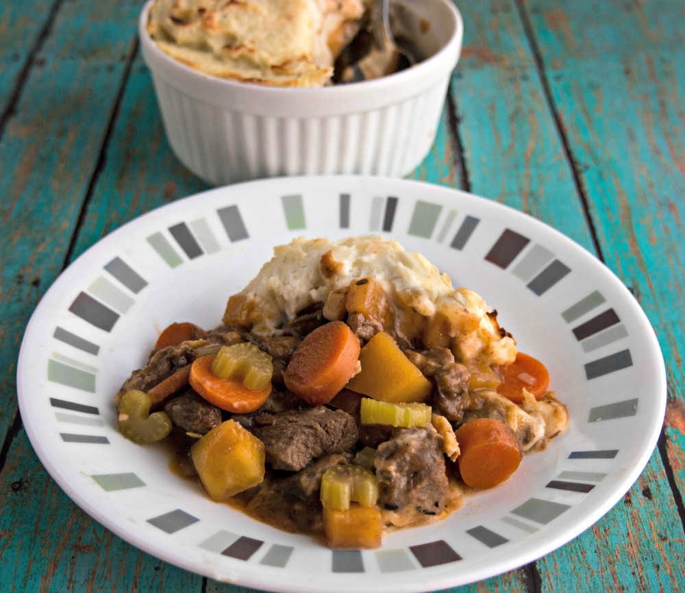 Shepherd's Pie with Lamb - a tasty comfort food casserole featuring chunks of lamb and vegetables topped off with creamy mashed potatoes.