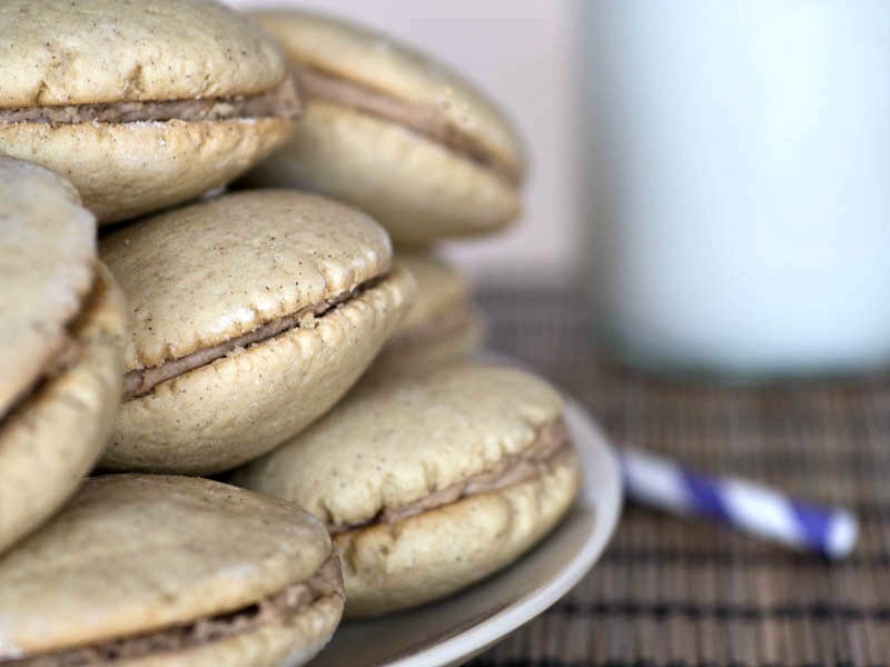 Maple Cream Cookies - a delicious cookie with creamy maple filling sandwiched between two spice cookies.