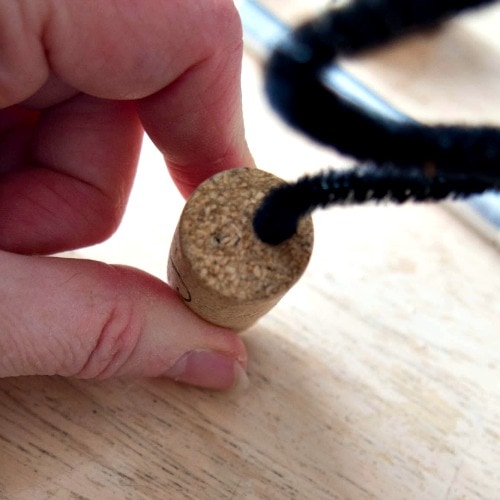 How to make a wine cork necklace with reindeer ornaments.