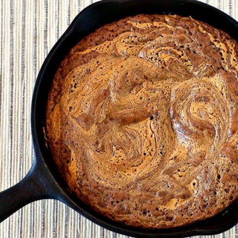 A skillet cake on a table.
