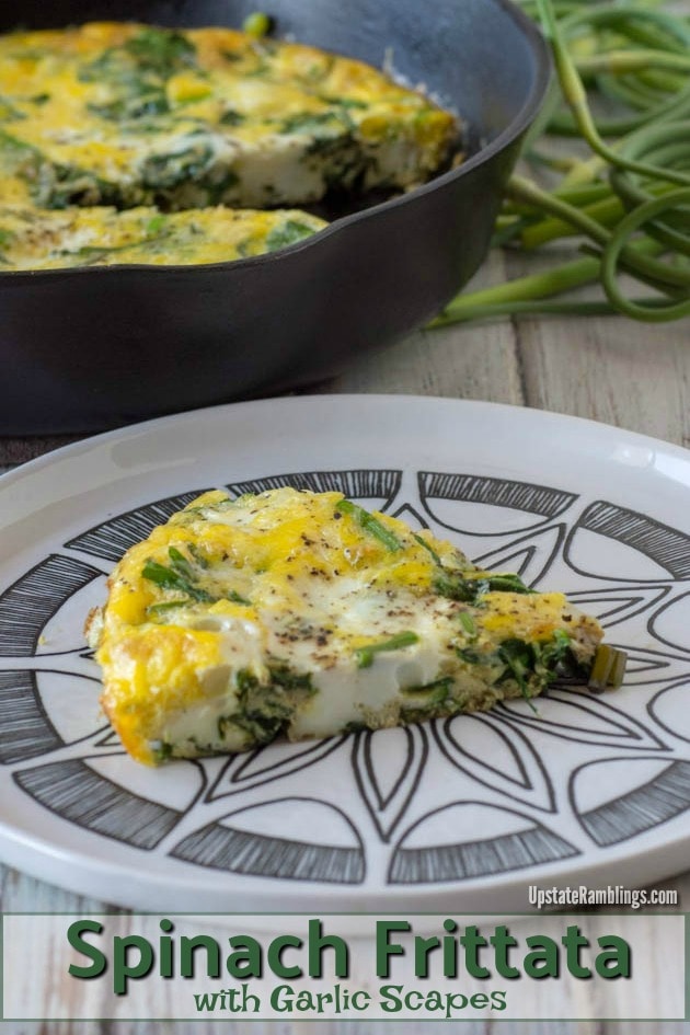 Spinach Frittata made in a cast iron skillet with garlic scapes