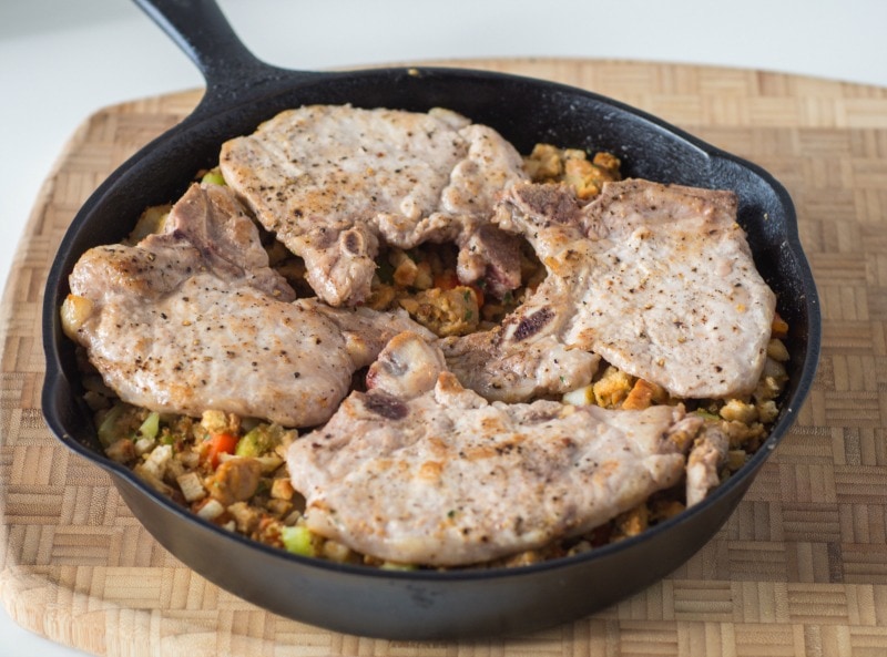 Cast iron skillet with skillet pork chops with stuffing