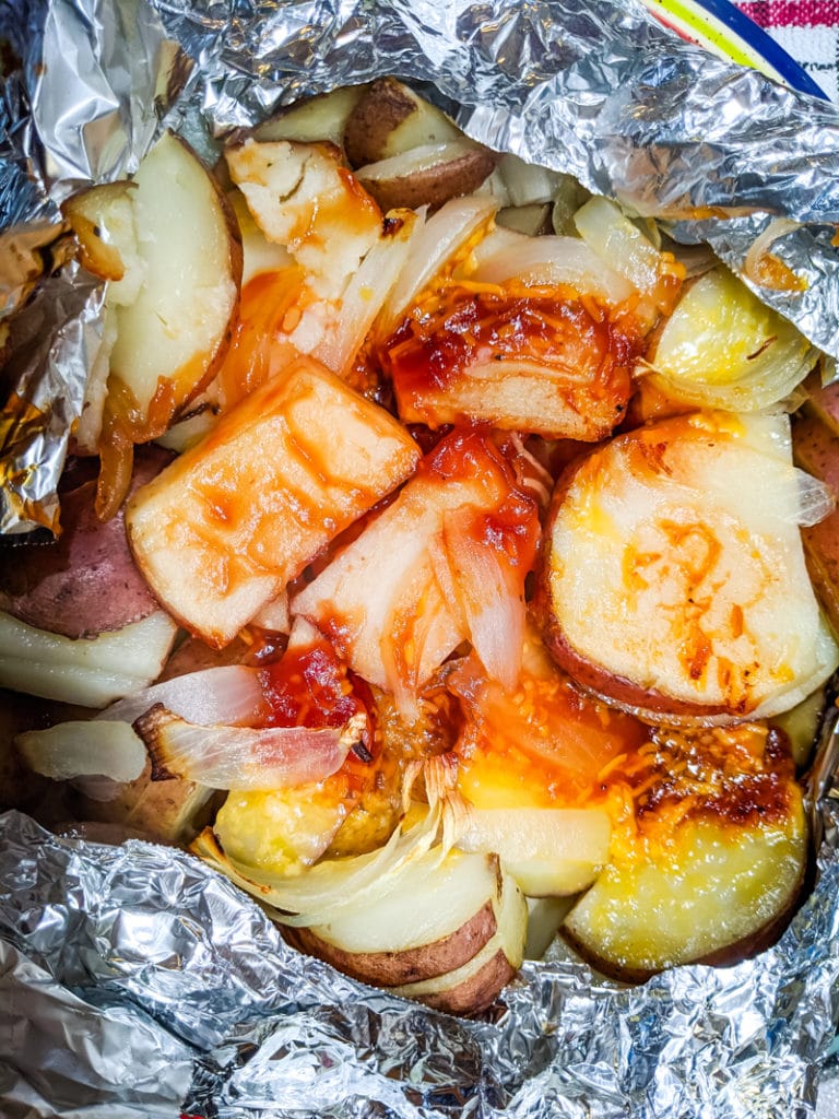 foil packet of potatoes after grilling