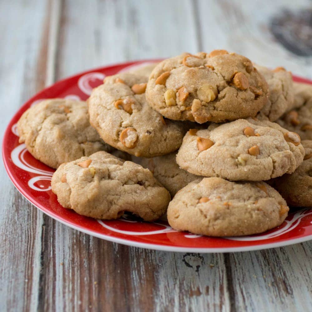 Butterscotch cookies on a red plate.