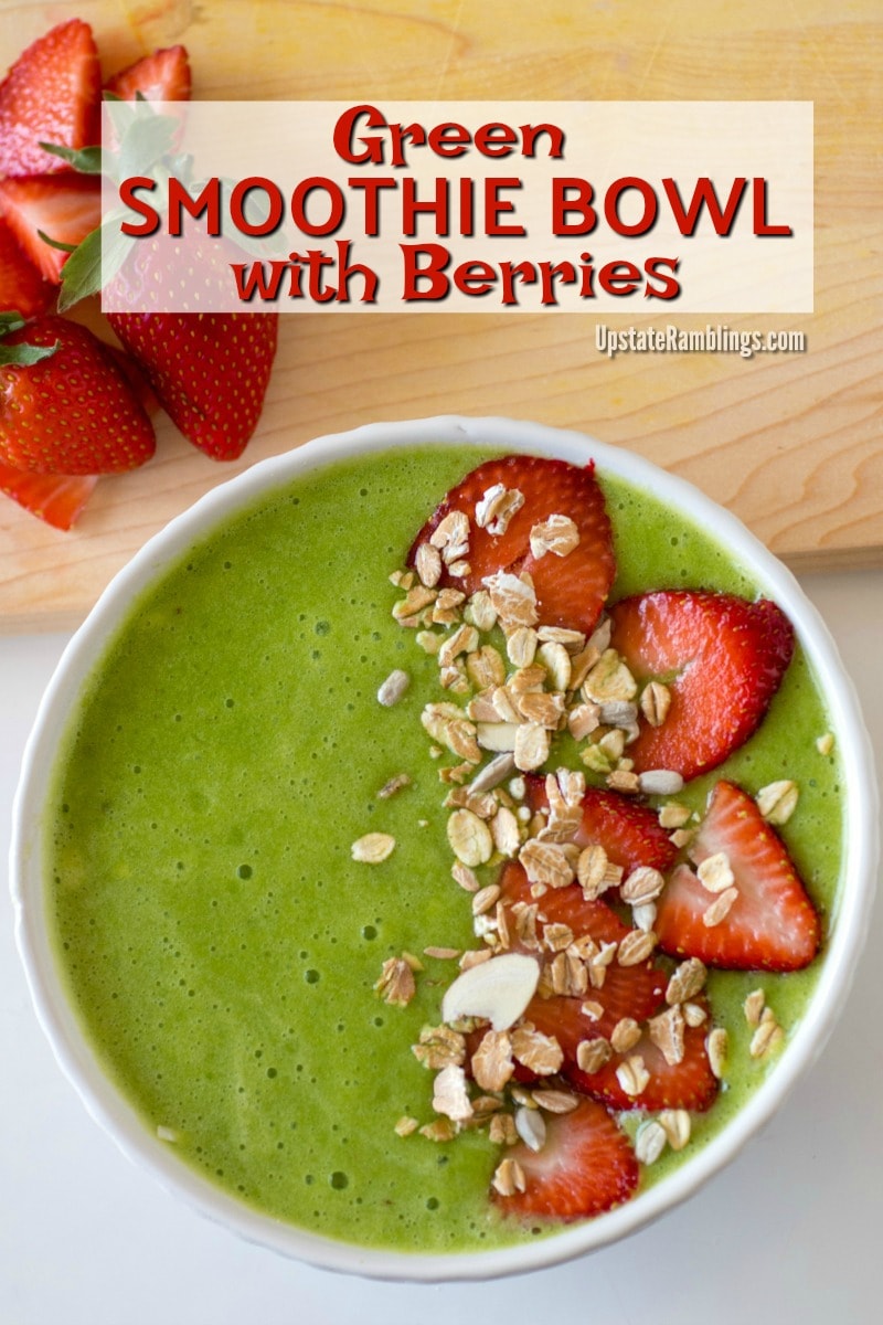 This vegan Green Smoothie Bowl with berries combines pineapple, orange, spinach and strawberries for a tasty and healthy breakfast meal that is full of fruit and ready in just a few minutes. #smoothiebowl #greensmoothiebowl #breakfast