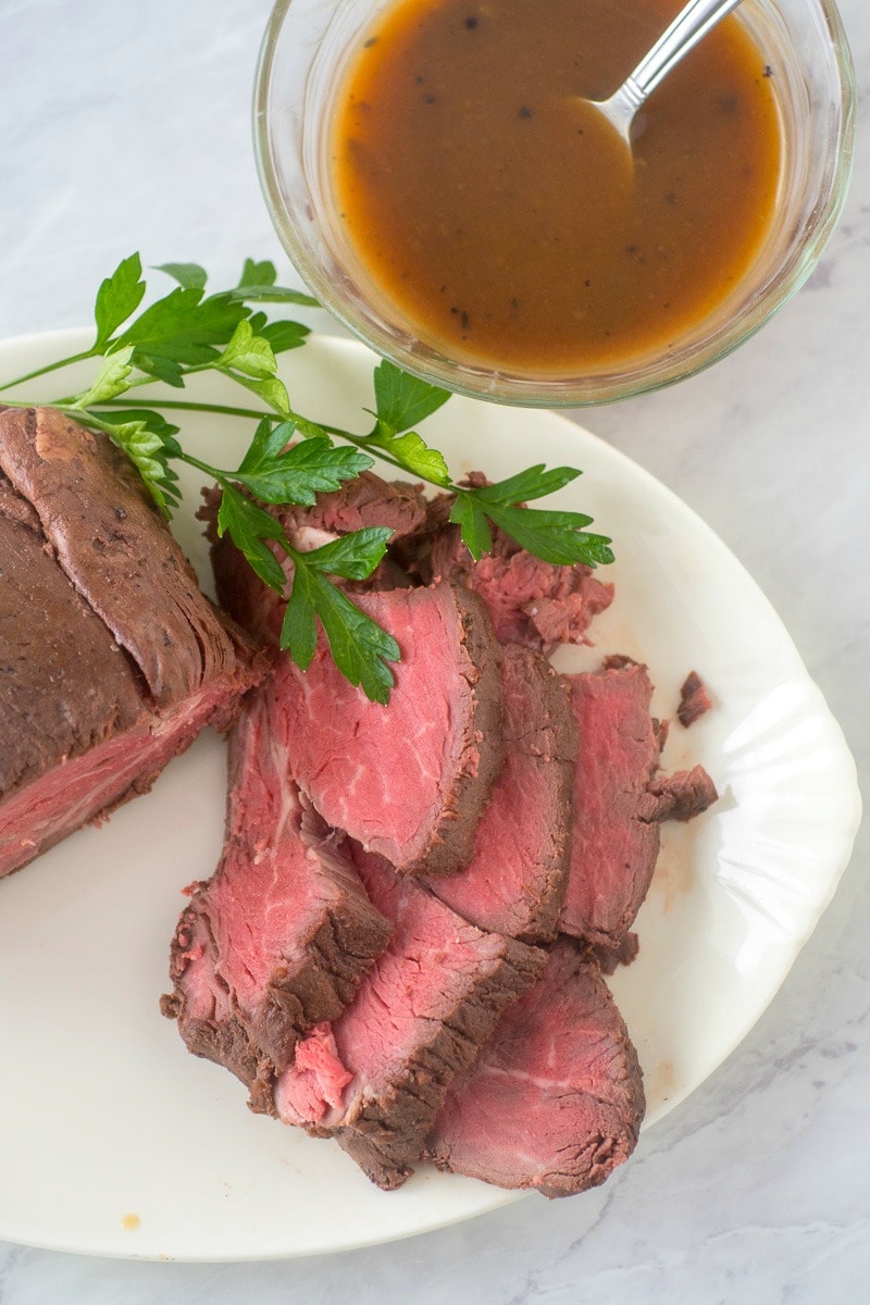 This recipe for Sous Vide Beef Tenderloin gives you the perfect roast every time. And an elegant beef tenderloin is the perfect centerpiece for a special dinner like Christmas Day or New Year's that is delicious and surprisingly easy to make. #beeftenderloin #sousvide #christmasdinner