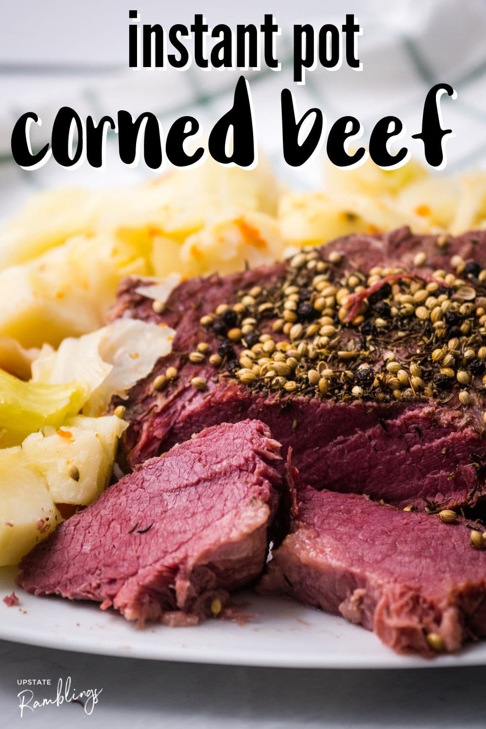 corned beef brisket on a platter with cabbage