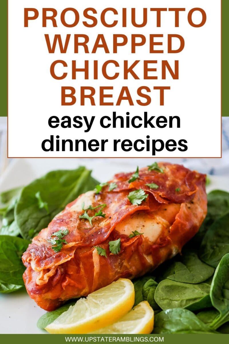 A savory prosciutto wrapped chicken breast served on a bed of fresh spinach with lemon slices, garnished with chopped herbs. Text above reads: “Prosciutto Wrapped Chicken - easy chicken dinner recipes.”.