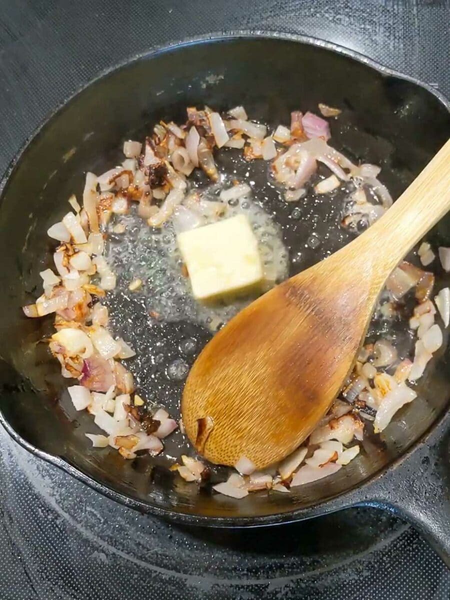 Cooking the shallots in butter.