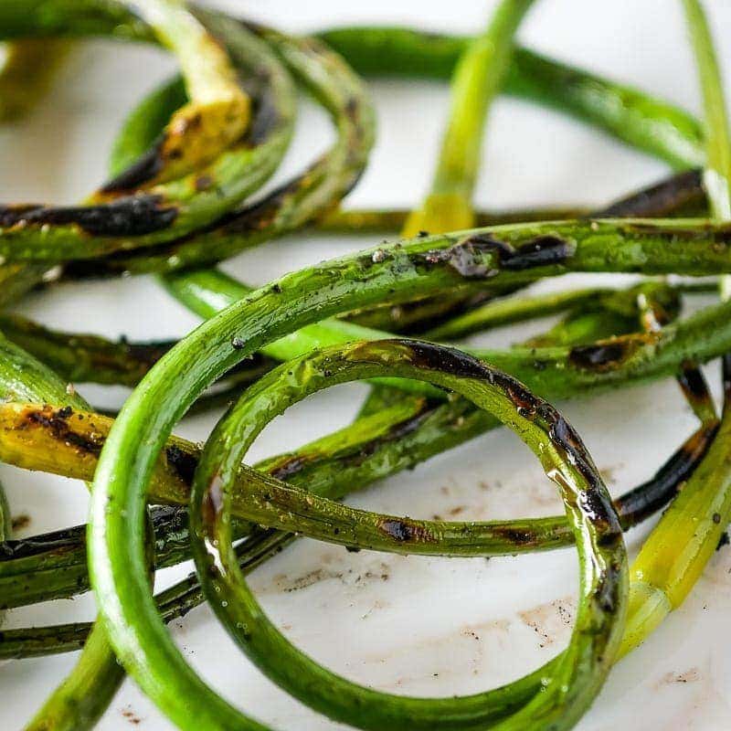 grilled garlic scapes with salt