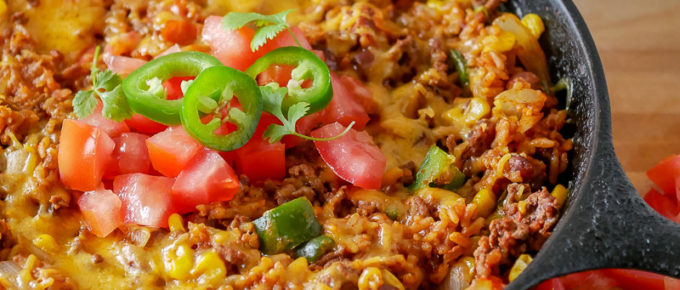taco skillet dinner - beef, tomatoes, cheese, rice and beans