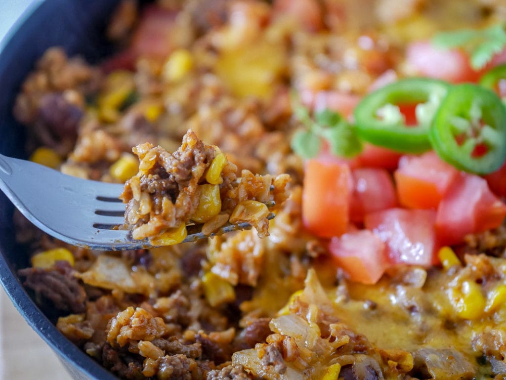 Fork showing taco rice skillet - an easy dinner idea