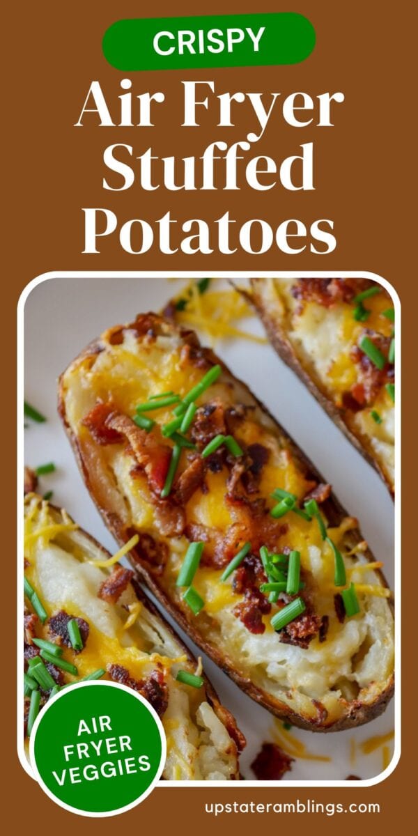 Stuffed potato halves topped with melted cheese, bacon bits, and chopped chives, arranged on a white plate—just like classic twice baked potatoes. Text overlay reads: "Crispy Air Fryer Stuffed Potatoes.