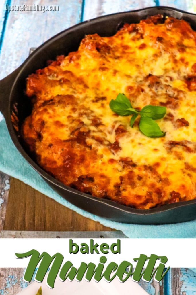 Baked manicotti cooked in a cast iron skillet