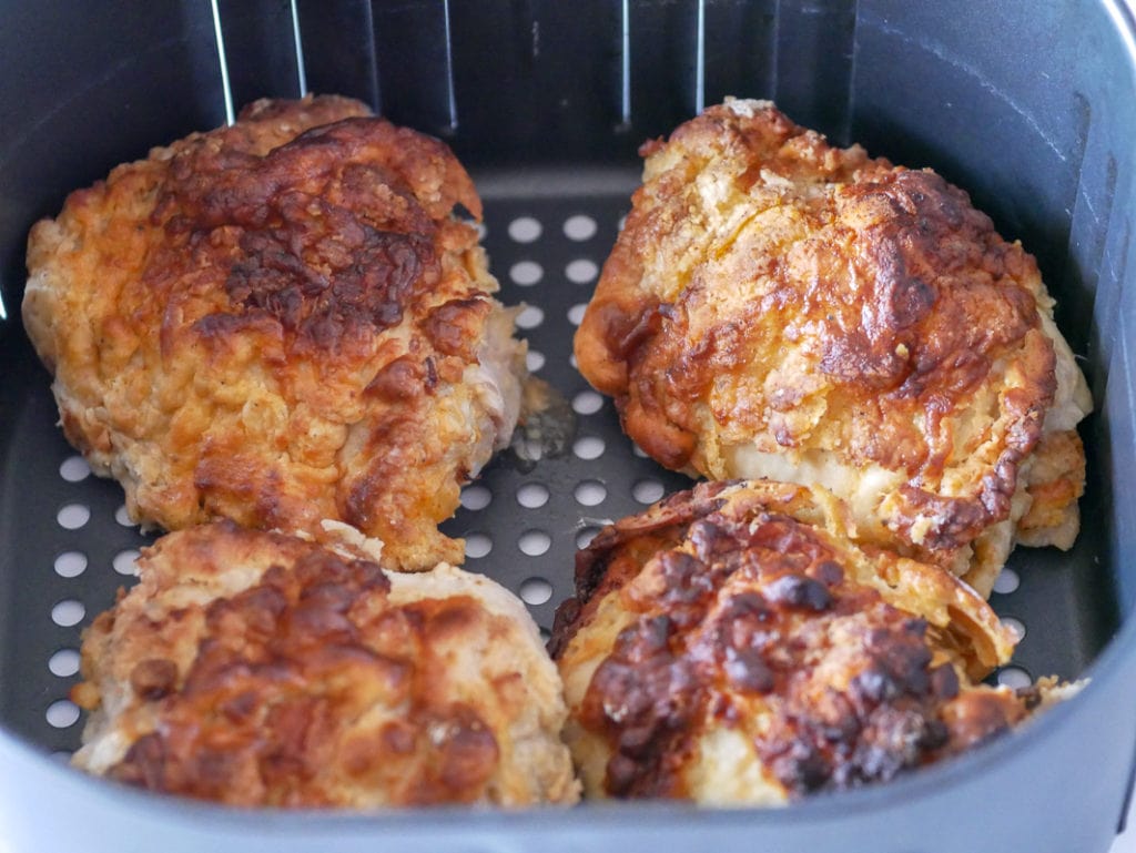 Fried chicken in an air fryer basket