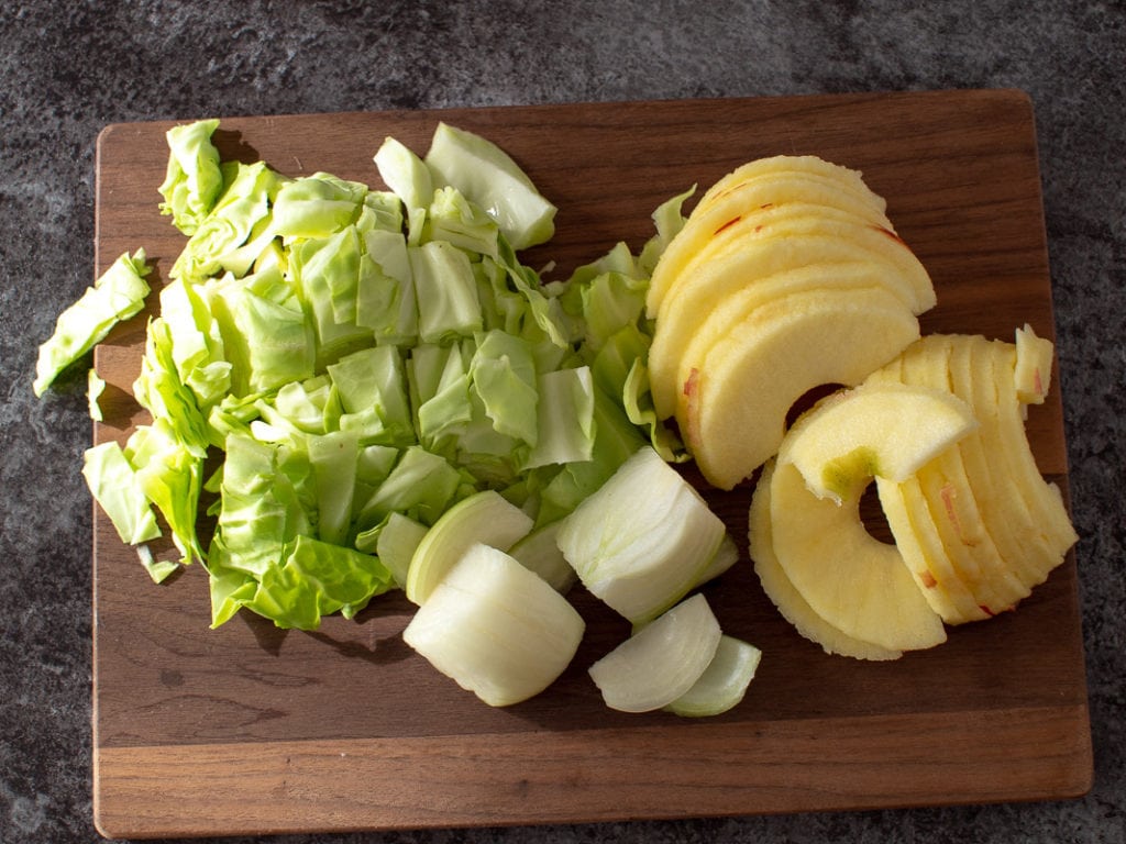 chopped cabbage, apples and onion