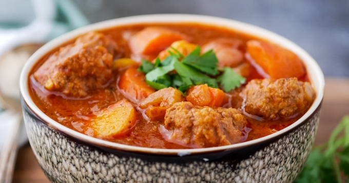close up of bowl of Instant Pot meatball soup