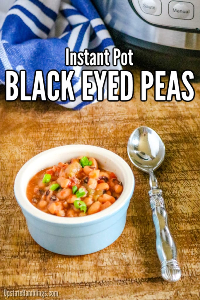 instant pot black eyed peas in a blue bowl in front of the Instant Pot