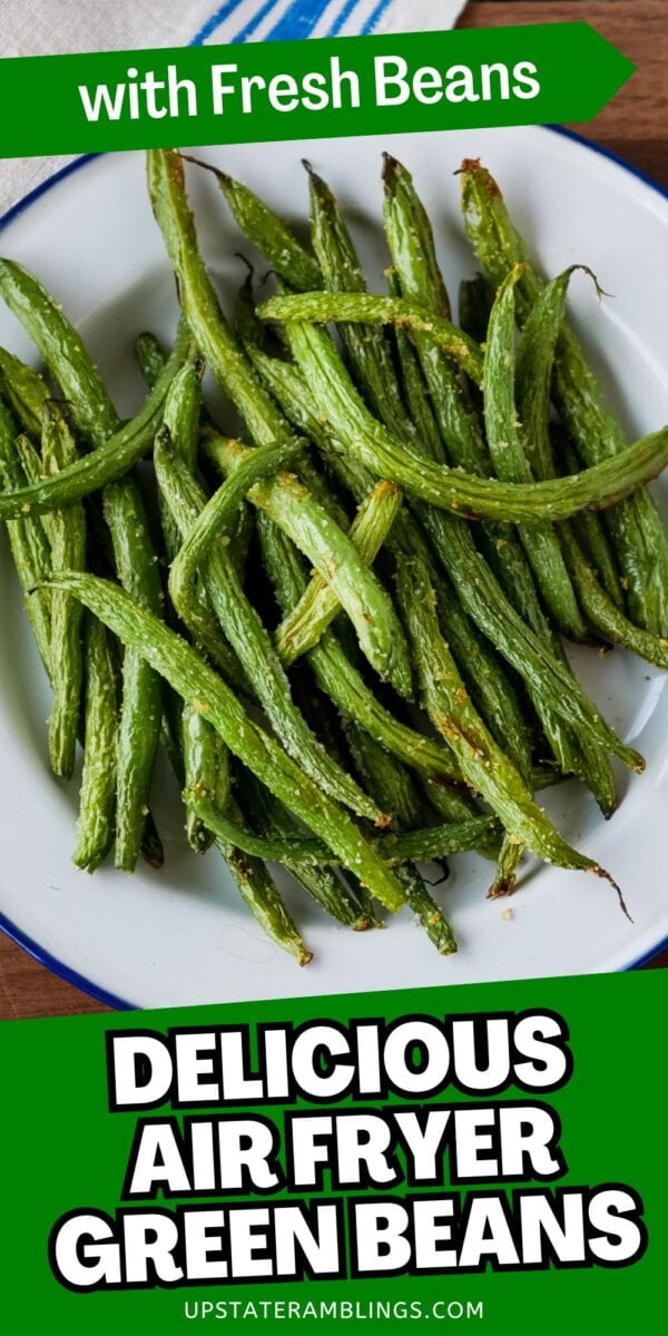 A plate of cooked air fryer green beans on a white dish with text that reads “Delicious Air Fryer Green Beans” and “with Fresh Beans.”.
