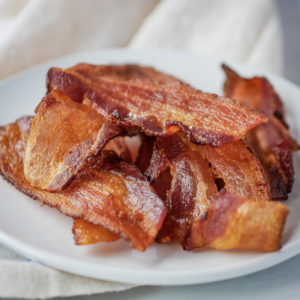 bacon on a white plate