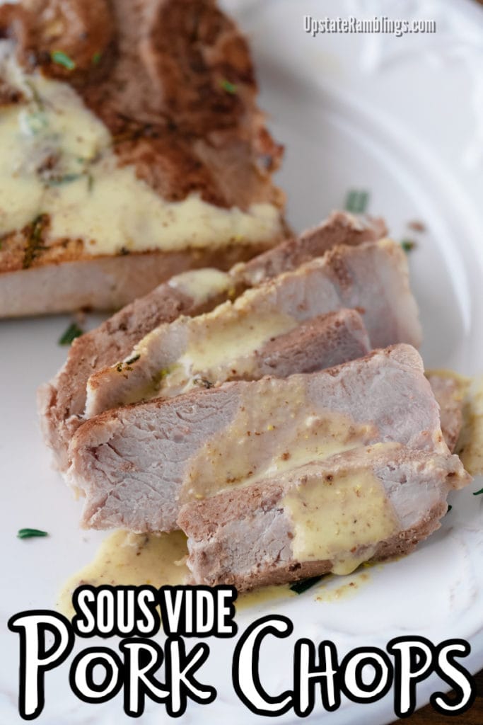 sous vide pork chops on a platter with mustard cream sauce