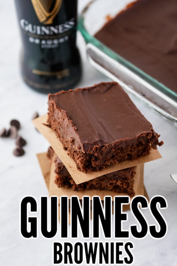 stack of Guinness brownies in front of a pan of brownies