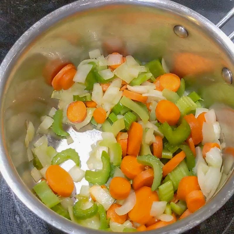 sauteing the vegetables for salmon chowder